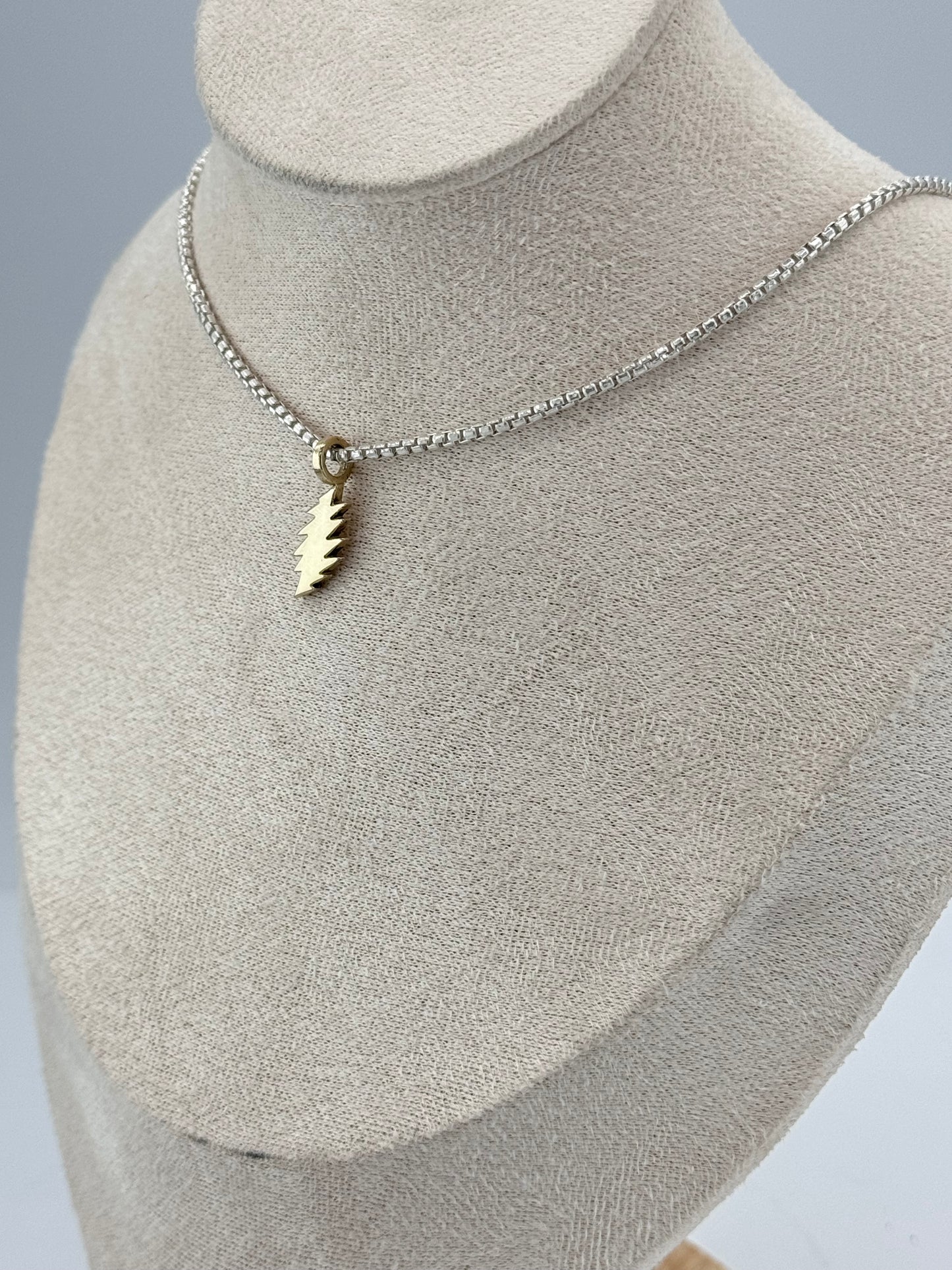 10k gold bolt pendant