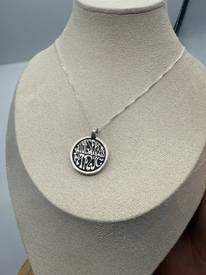 widespread circle logo in sterling silver