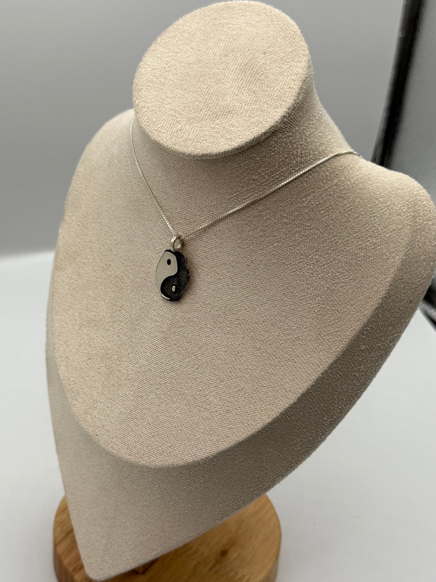 Elongated yin yang pendant