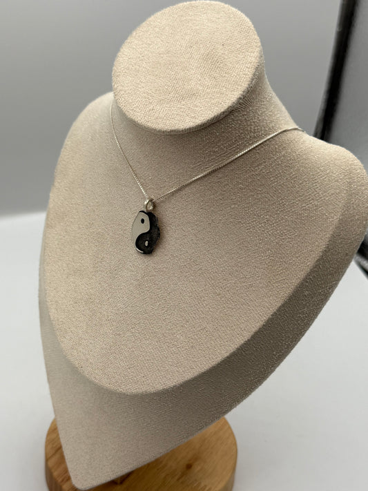 Elongated yin yang pendant