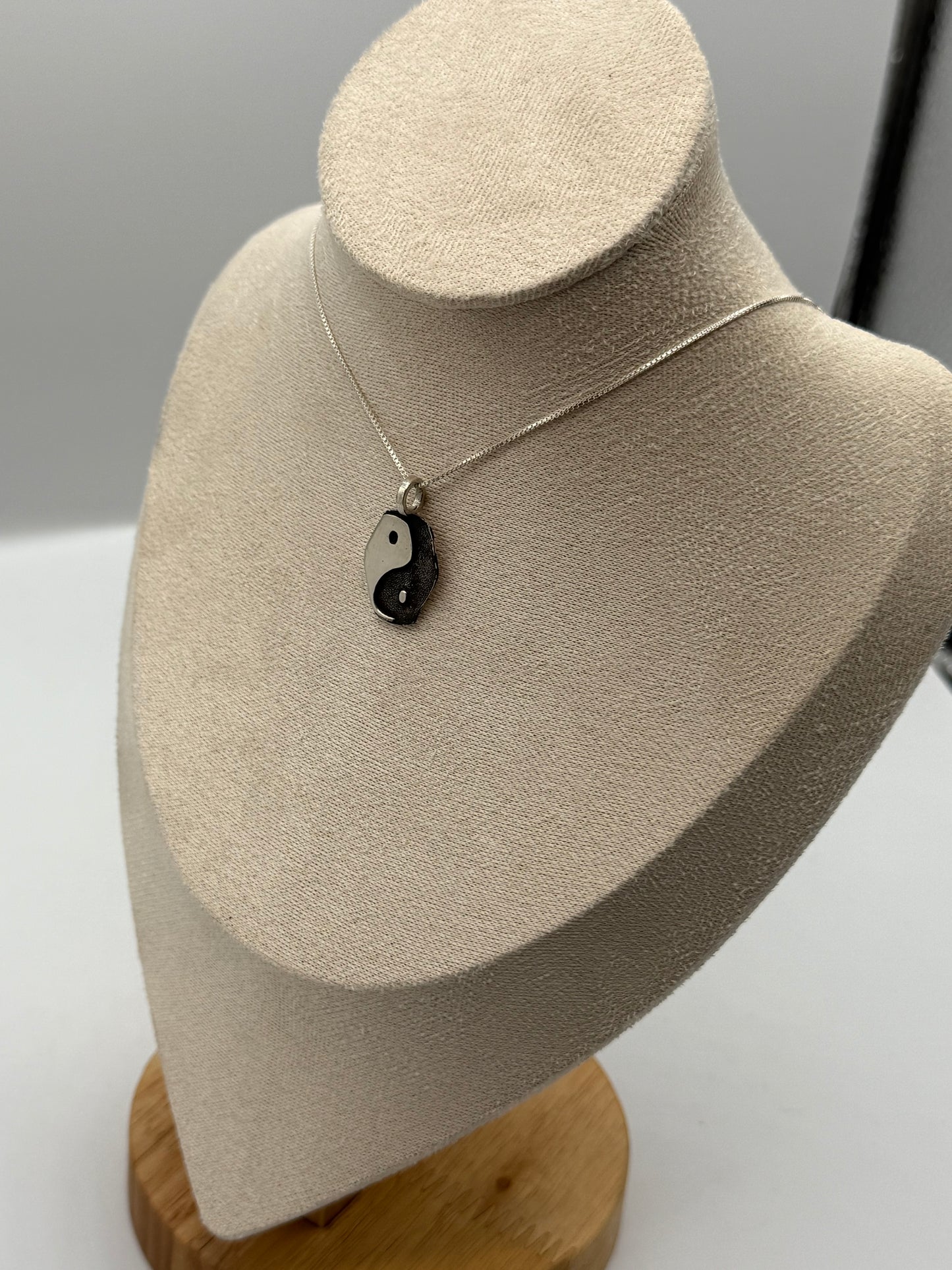 Elongated yin yang pendant