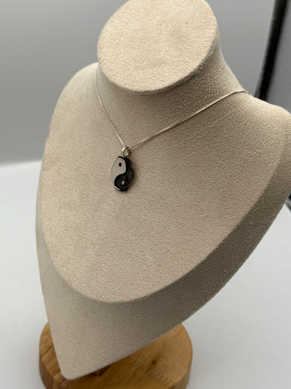 Elongated yin yang pendant