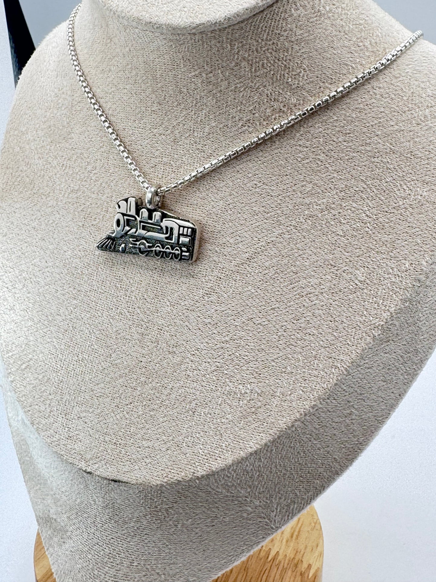 Sterling silver train pendant