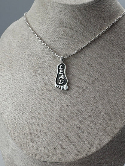 lead foot sterling silver pendant