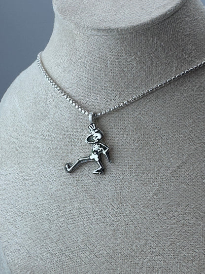 dancing skeleton pendant