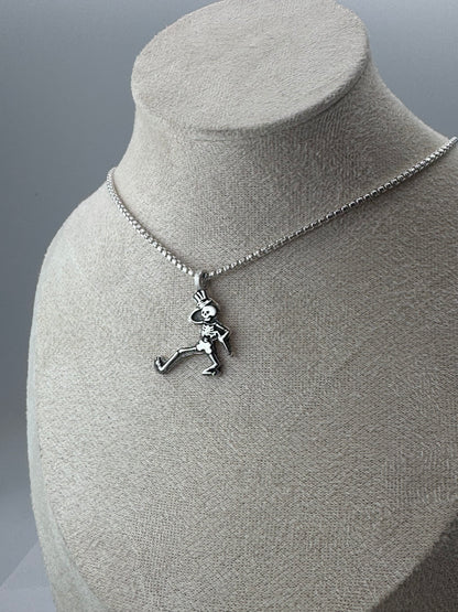 dancing skeleton pendant